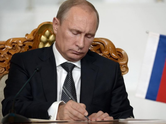 Путин подписал пакет законов о защите капиталовложений