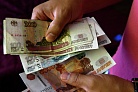Эксперты выяснили, когда может упасть курс рубля